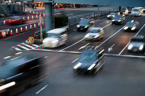 people-driving-cars-city-street